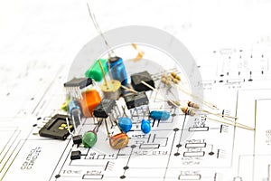 Electronic components on a schematic diagram background. photo