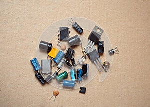 Electronic components isolated on a brown