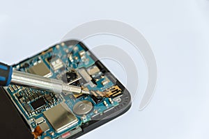 An electronic device and chips isolated on a white background.