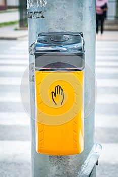 Electronic device sensor on the pole of the traffic light for pedestrians to turn green signal on the crosswalk, safety technology