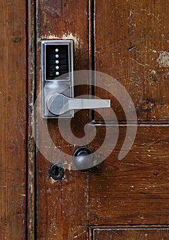 Electronic Door Handle With Numeric Buttons on Old Door