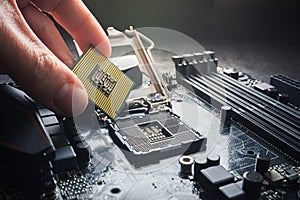 Electronic engineer of computer technology. Maintenance computer cpu hardware upgrade of motherboard component. Pc