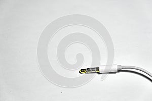 Electronic female socket of earpiece for phone connection with white isolated background a