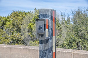 Electronic gate lock with key code at the Lake Austin Dam facility in Texas