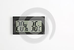 Electronic humidity meter and temperature on white background