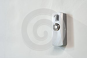 Electronic key access system door lock on the wall.