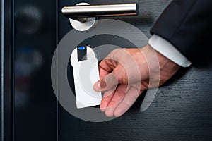Electronic keycard for room door in modern hotel
