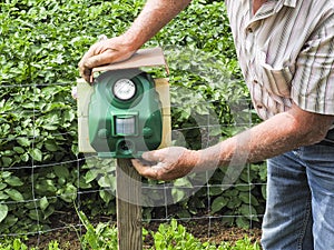 Electronic machine placed in front of a garden to scare away frighten not only birds but wild animals.