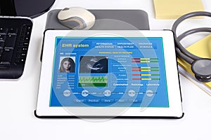 Electronic medical record on tablet.
