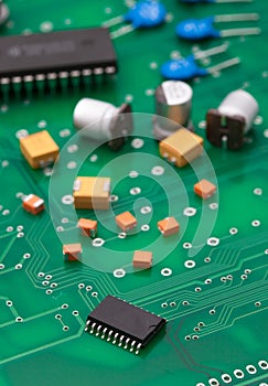 Electronic part on green PCB