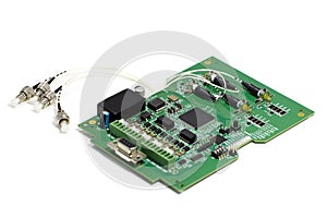 Electronic printed circuit board with optic connectors attached and other components, front side, angled view, isolated on white