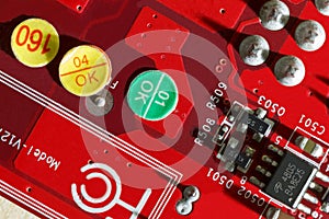 Electronic Printed Circuit Board in red with Electronic components- top view