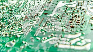 Electronic printed circuit board with soldered contacts on the reverse side of the parts.