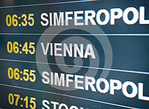 Electronic scoreboard flights and airlines. Destinations: Simferopol, Vienna. Airport flight information arrival
