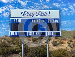 Electronic scoreboard at a youth baseball field