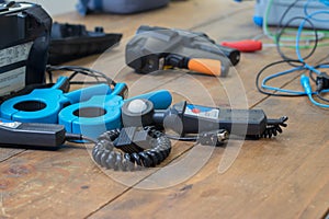 Electronic Testing Equipment on a Wooden Workbench Closeup