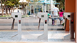 Electronic turnstiles in front of amusment park