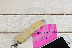 Electronic urn concept: Electronic equipments on white background