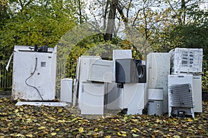 Electronic waste Awaiting recycling. A pile of garbage in nature. Green strategy recycling