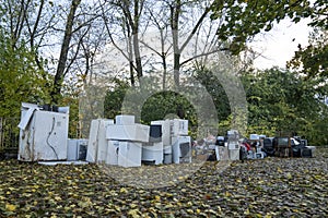 Electronic waste Awaiting recycling. A pile of garbage in nature. Green strategy recycling