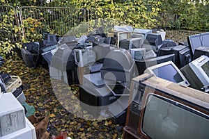 Electronic waste Awaiting recycling. A pile of garbage in nature. Green strategy recycling