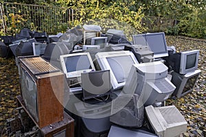 Electronic waste Awaiting recycling. A pile of garbage in nature. Green strategy recycling