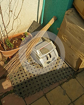 Electronic waste discarded equipment on floor