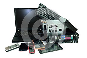 Electronic waste, gadgets electronic equipment for daily use, Laptop and Desktop computer and cell phones isolated on white