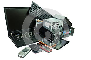 Electronic waste, gadgets electronic equipment for daily use, Laptop and Desktop computer and cell phones isolated on white