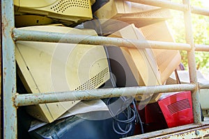 electronic waste stack together Monitor, Printer, desktop computer, for waiting to be recycled. Produced from plastic, copper,