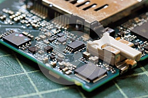 Electronics background technology close up of the green kit circuit board.