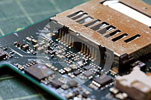 Electronics background technology close up of the green kit circuit board.