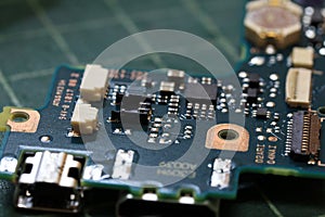 Electronics background technology close up of the green kit circuit board.