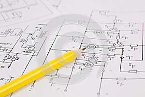 Electronics and Engineering. Pencil on printed drawings of elect