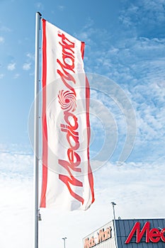 Electronics hypermarkets flag in the wind