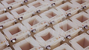 Electronics industry - camera slide over many transformer coils