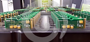 Electronics Manufacturing Services, Assembly Of Circuit Board arrangement, close-up of the raw of PCBA in tray