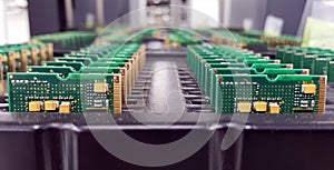 Electronics Manufacturing Services, Assembly Of Circuit Board arrangement, close-up of the raw of PCBA in tray
