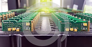 Electronics Manufacturing Services, Assembly Of Circuit Board arrangement, close-up of the raw of PCBA in tray