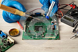 Electronics manufacturing services, manual soldering of electronic boards. Repair of computers or electronics by a foreman in a