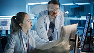 Electronics Research, Development Facility: Engineer Project Manager Consults Scientist working on