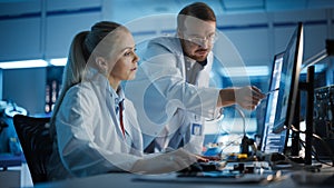 Electronics Research, Development Facility: Engineer Project Manager Talks With Scientist working on