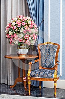 Elegance armchair with beautiful flower bouquet