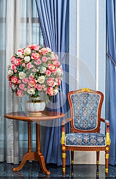 Elegance armchair with beautiful flower bouquet