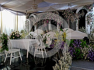 Elegance beautiful decoration tables, chairs and flowers. Beautiful decoration for a wedding.