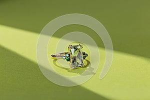 Elegance gold ring with green gemstone