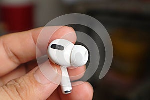 Elegance in Hand: White AirPods