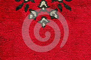 Elegance red color carpet texture.