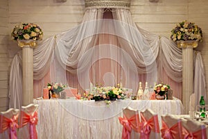 Elegance table set up for wedding. Flowers in the vase.