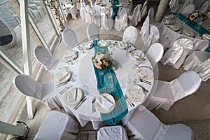 Elegance table set up for wedding in turquoise top view